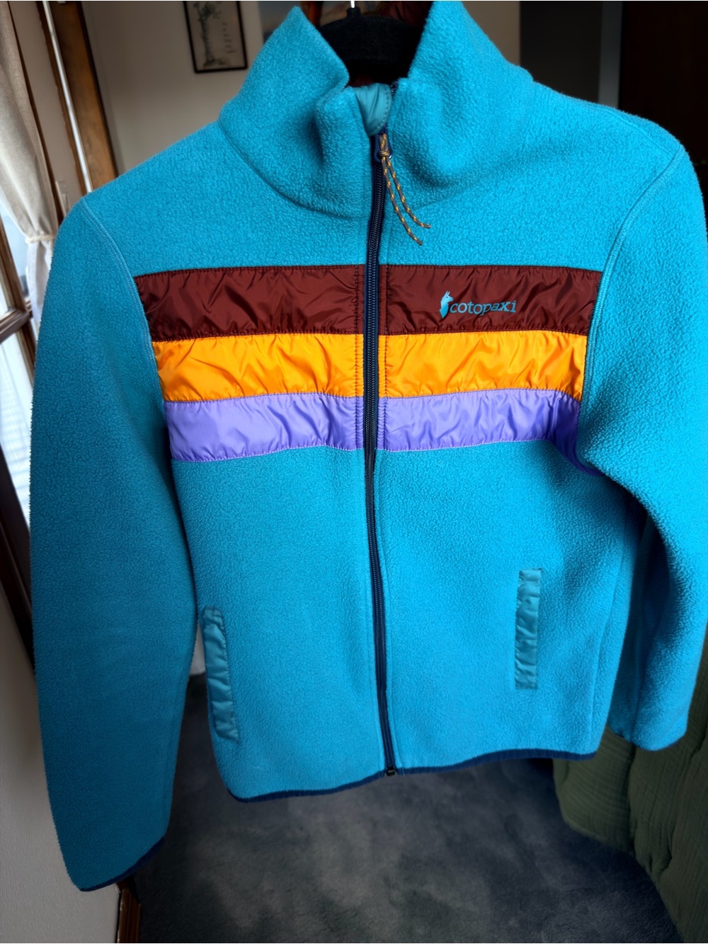cotopaxi Teal Fleece Jacket with Brown, Yellow & Purple Stripes